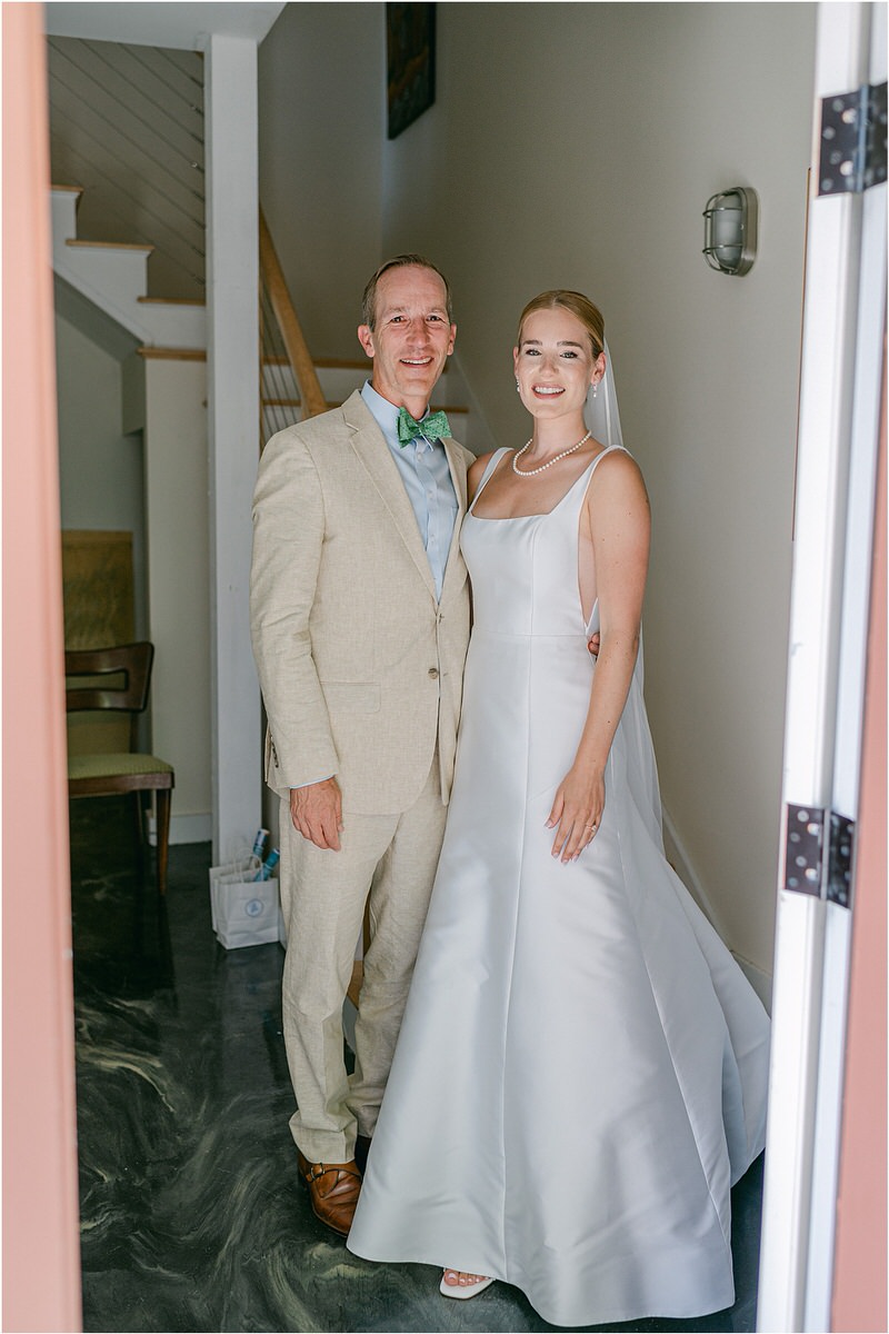 Father and daughter stand together for Maine Coastal Wedding