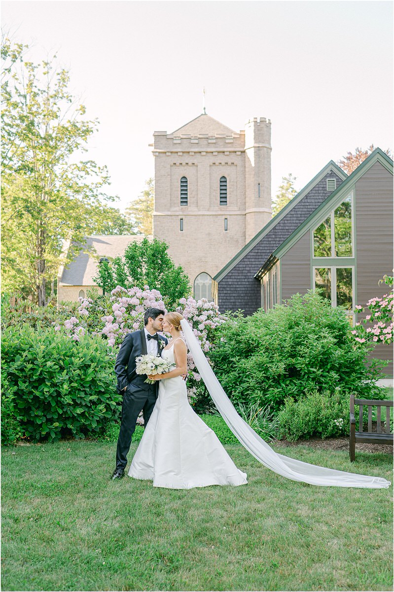 Bride and groom share a kiss for Rachel Campbell Photography