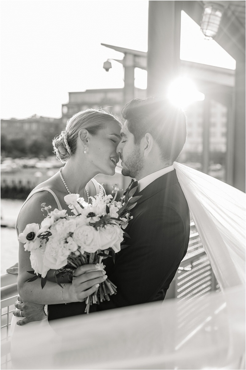 Couple lean in close for tender moment by Rachel Campbell Photography