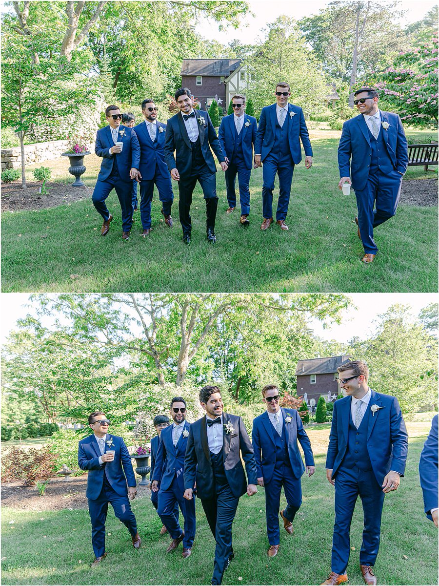 Grooms and groomsmen walk together for Rachel Campbell Photography