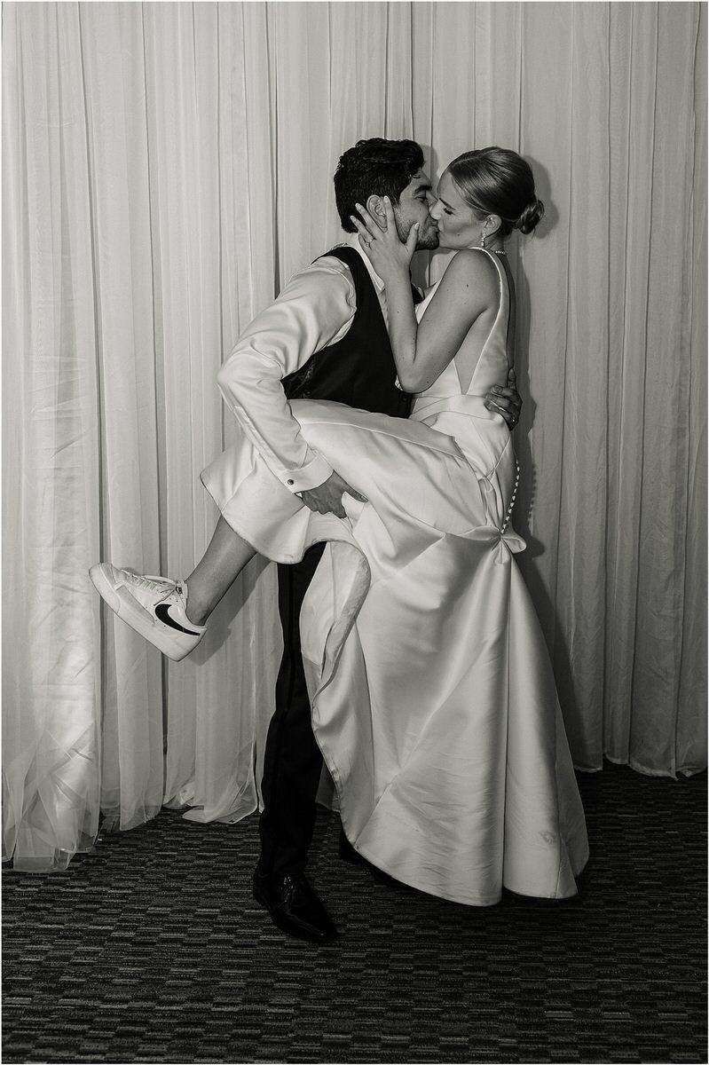 Couple share a kiss for Rachel Campbell Photography