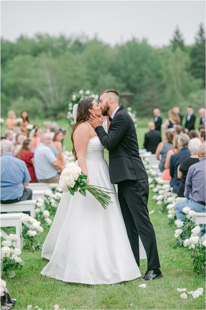 Couple share a kiss for Owls Head, ME Wedding 