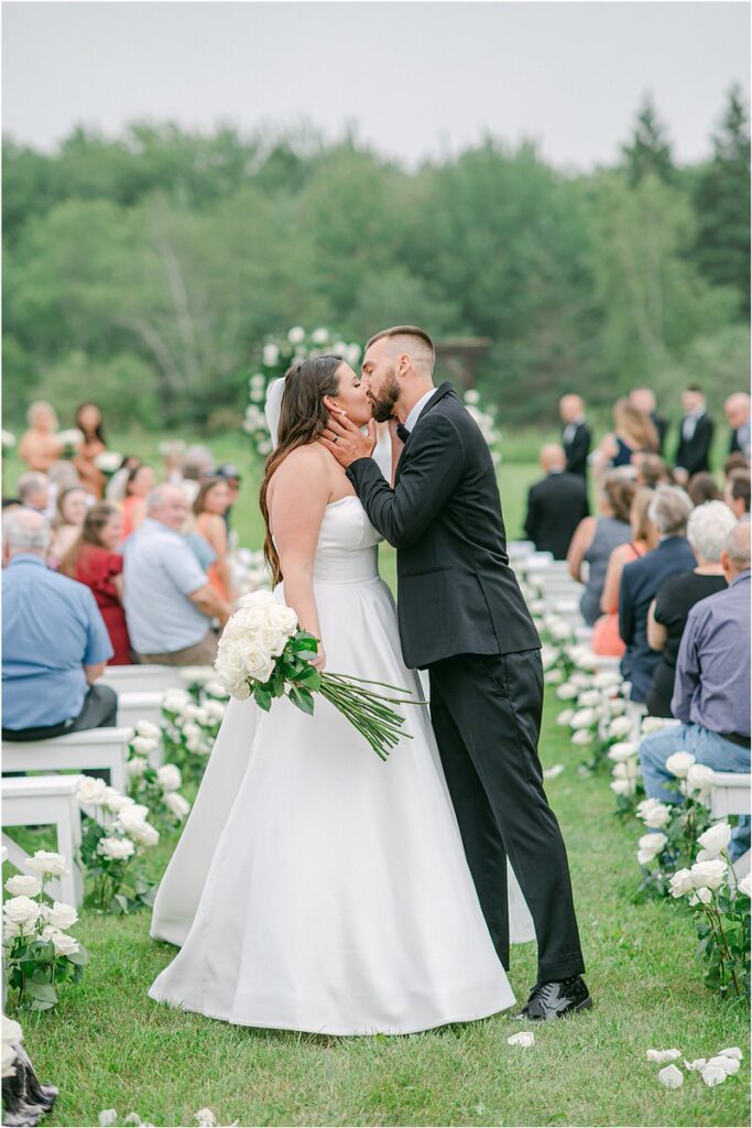 Couple share a kiss for Owls Head, ME Wedding 