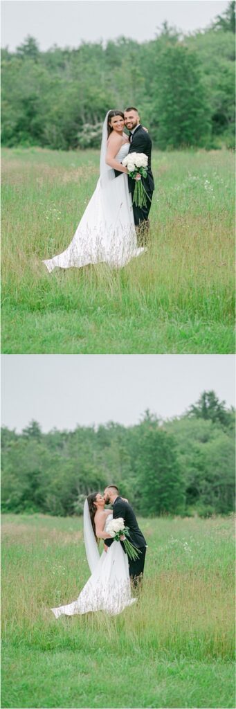 Husband and wife share a kiss and hug in a green field for Owls Head, ME Wedding 