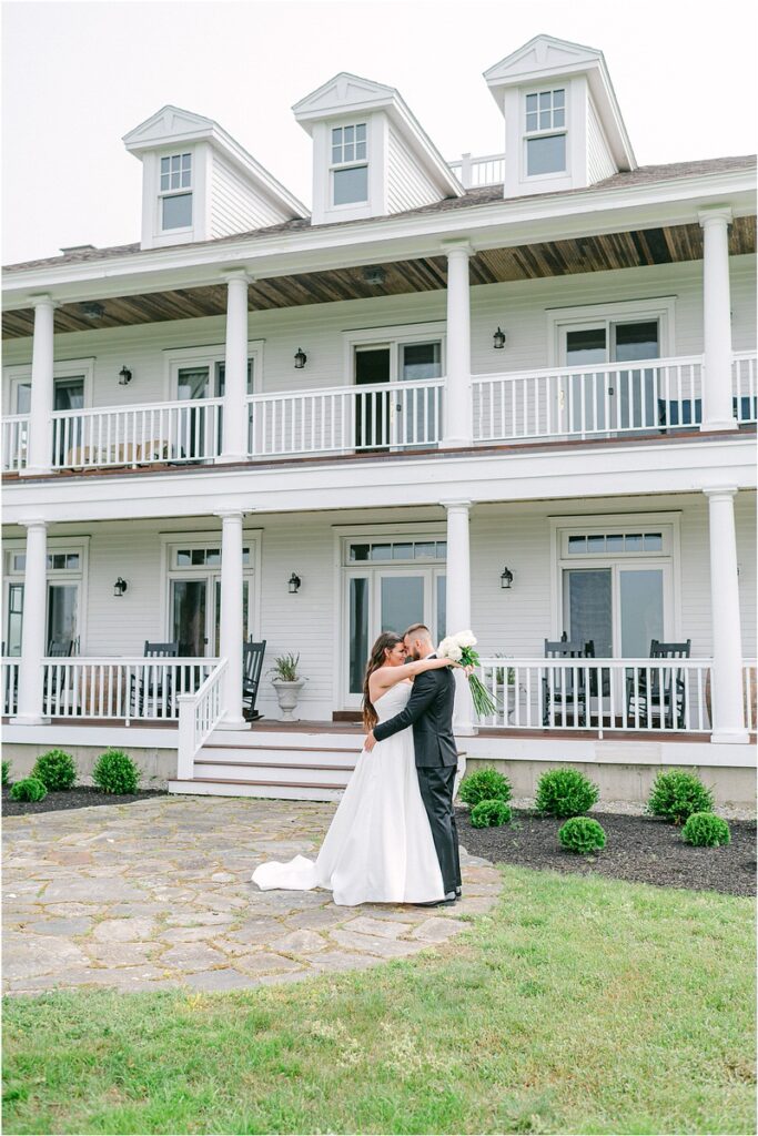 Husband and wife share a big hug for Owls Head, ME Wedding 