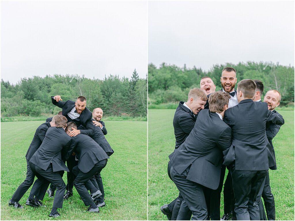 Groomsmen throw groom in the air for Summer Maine Wedding