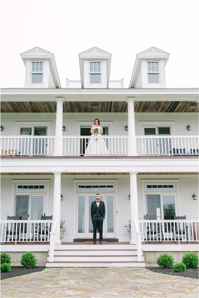 Future husband and wife stand near one another for Maine Barn Wedding
