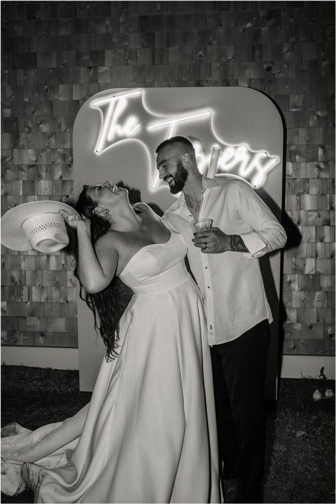 Bride and groom laugh together for Campbell Photography