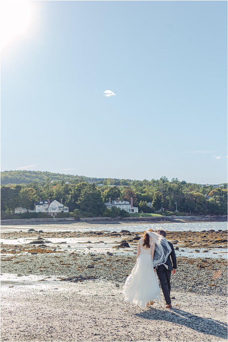 Bride and groom walk together for wedding at Bar Harbor Club