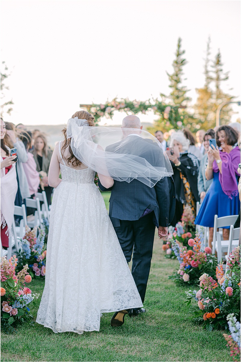 Father and daughter walk down the aisle for Maine Fall Wedding