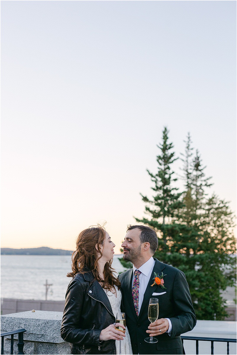 Couple toast to their happy future at Maine Fall Wedding