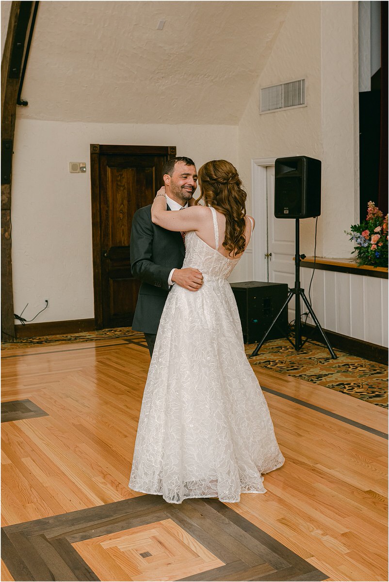 Husband and wife dance together by Rachel Campbell Photography