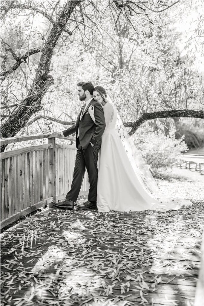 Husband and wife cuddle in close together at Beech Ridge Barn