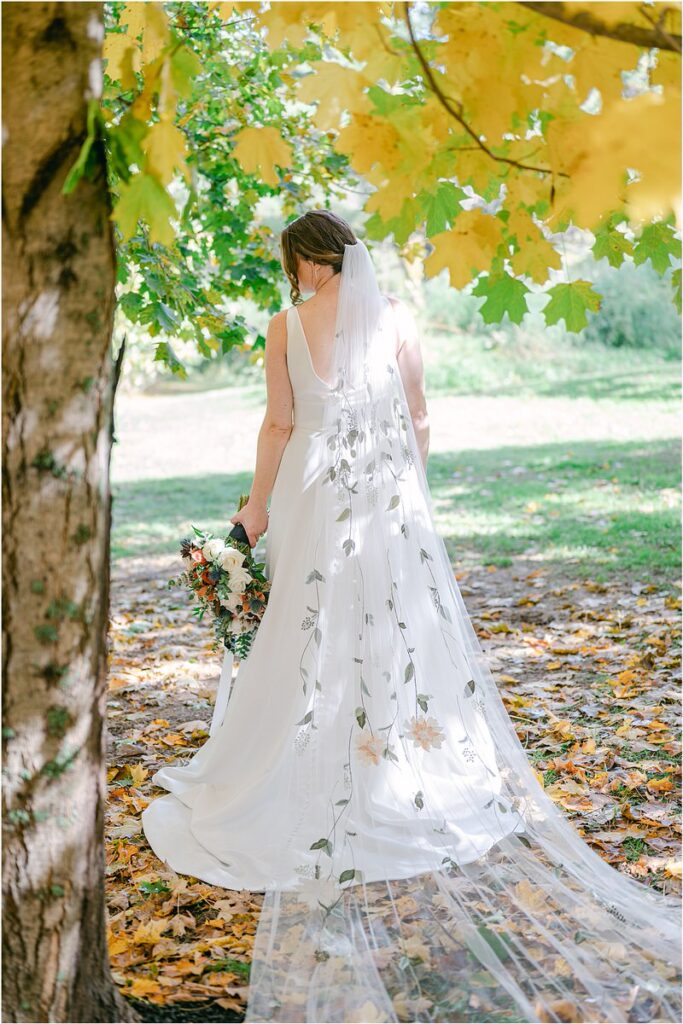 Bride holds bouquet at Beech Ridge Barn
