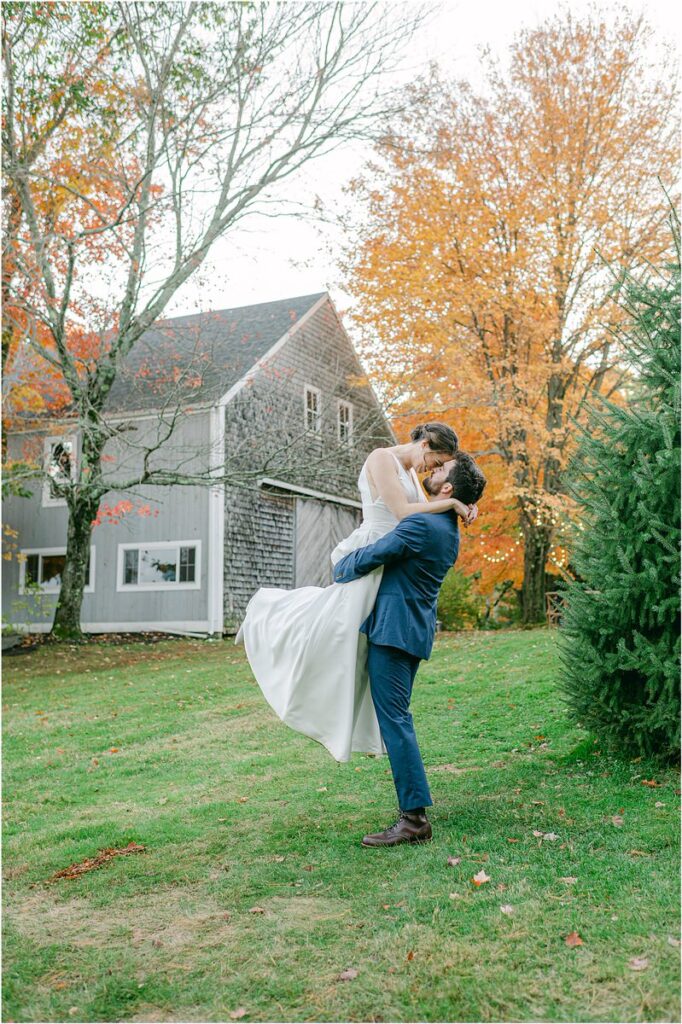 Bride and groom share a kiss at Beech Ridge Barn