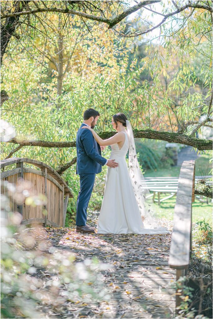 Couple stand together at Beech Ridge Barn