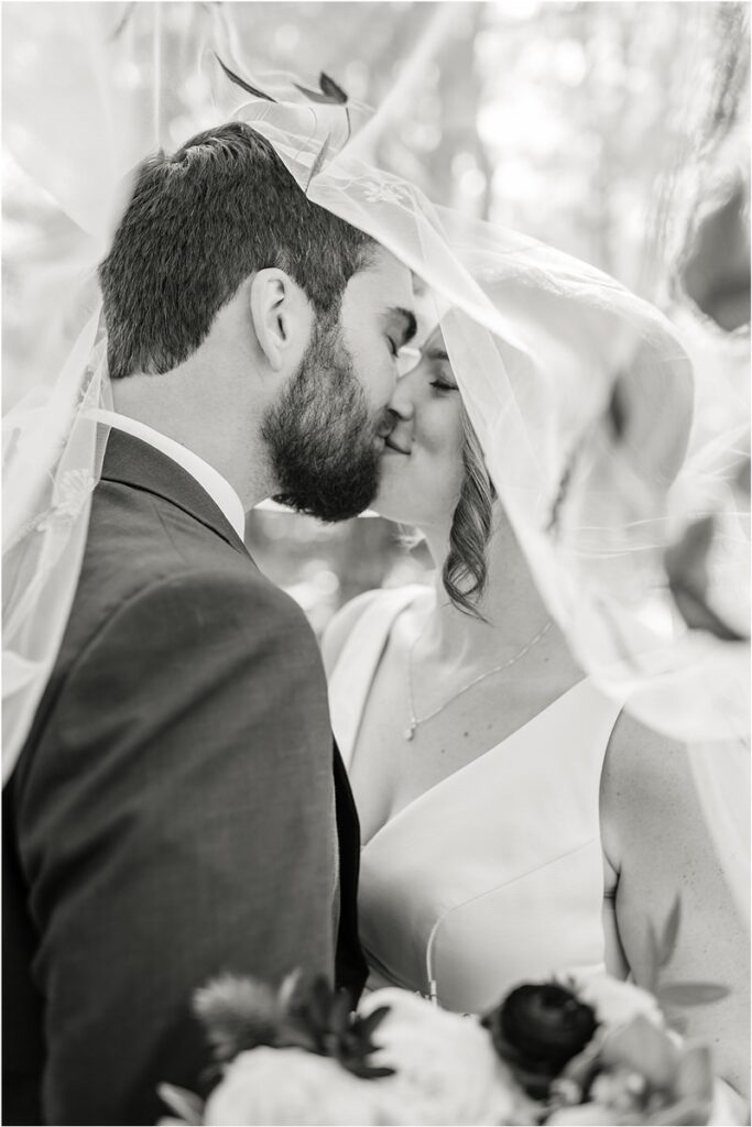 Couple share a kiss for Rachel Campbell Photographyhel Cam