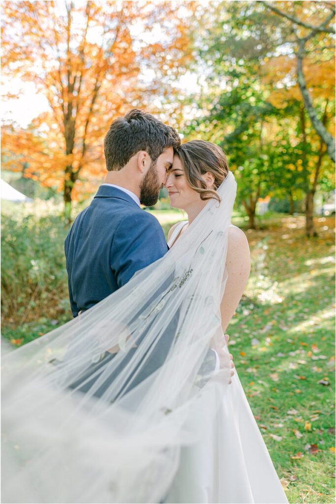 Husband and wife hold one another close for Rachel Campbell Photographyhel Cam