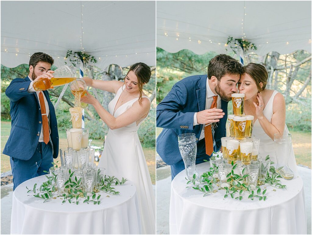 Husband and wife share a drink from the beer tower for Rachel Campbell Photographyhel Cam