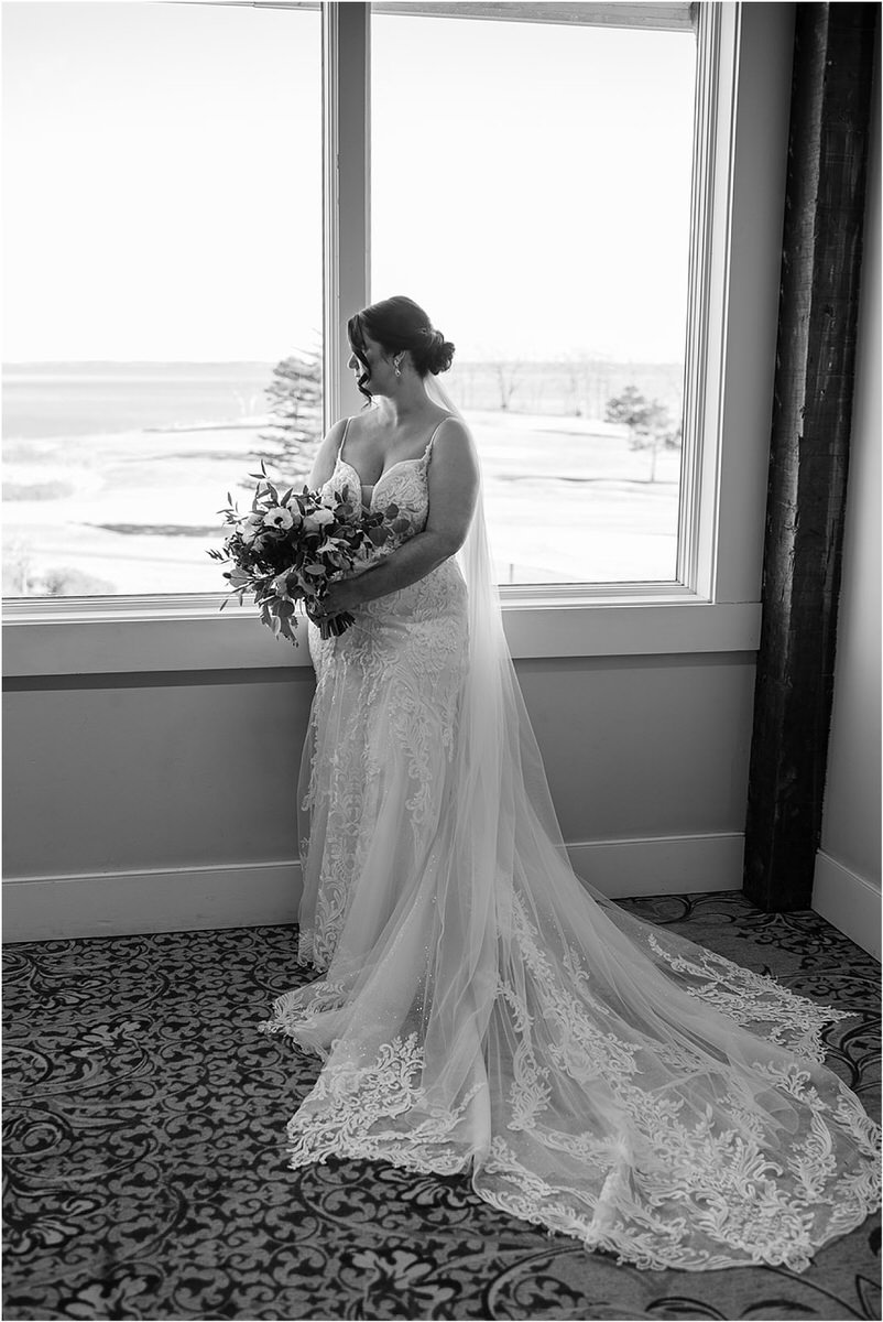 Bride holds boquet for wedding at Samoset Resort