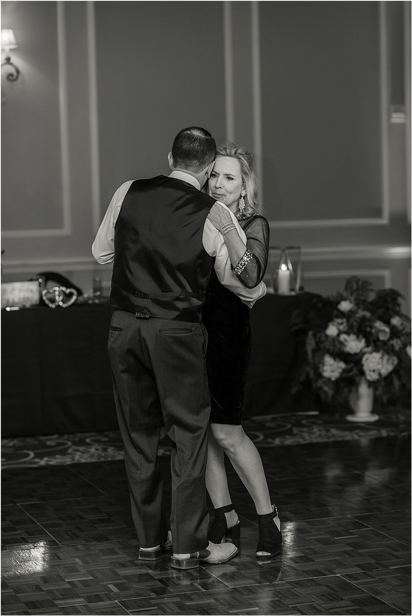 Mother and son dance together by Rachel Campbell Photography