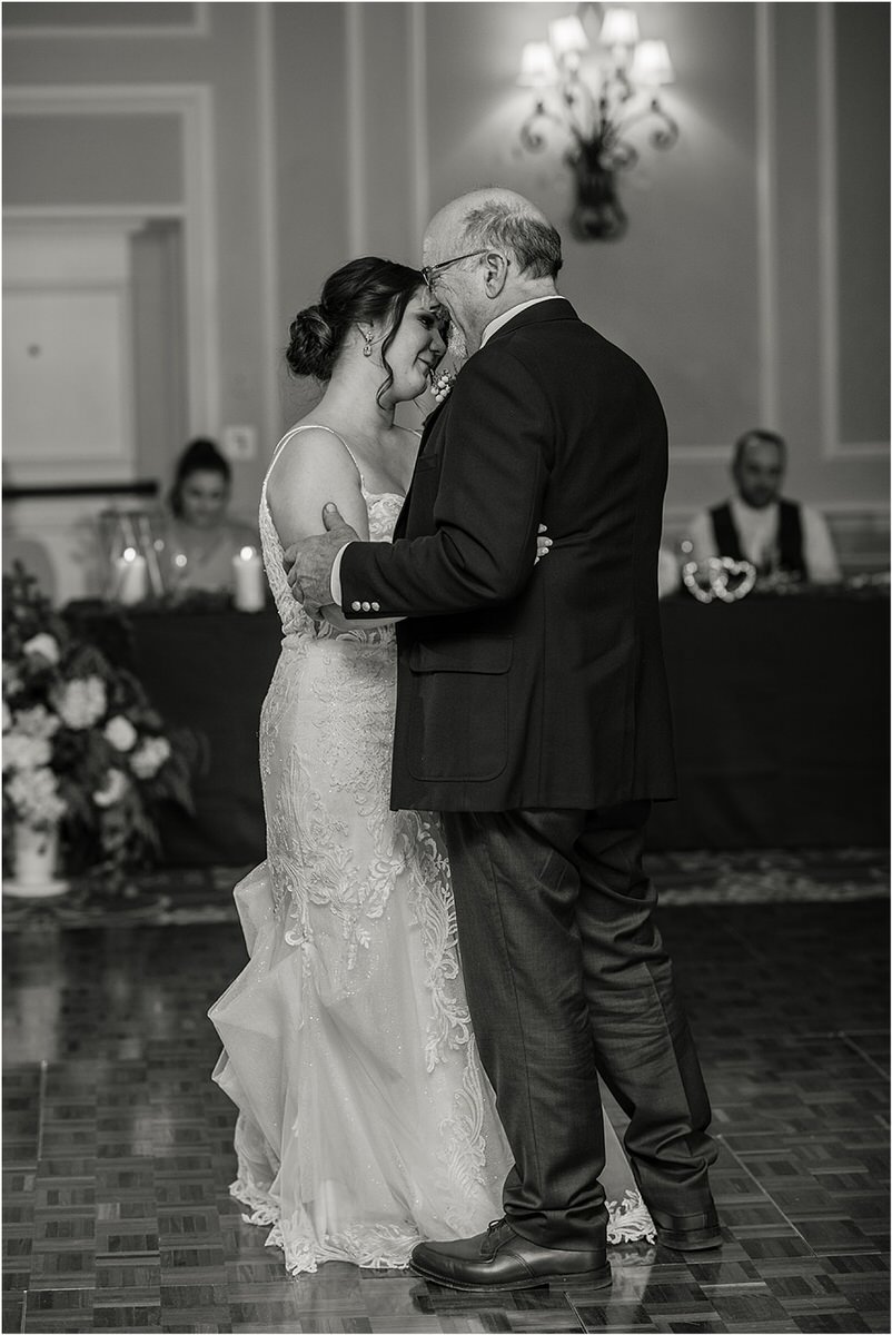Father and daughter share a dance by Rachel Campbell Photography