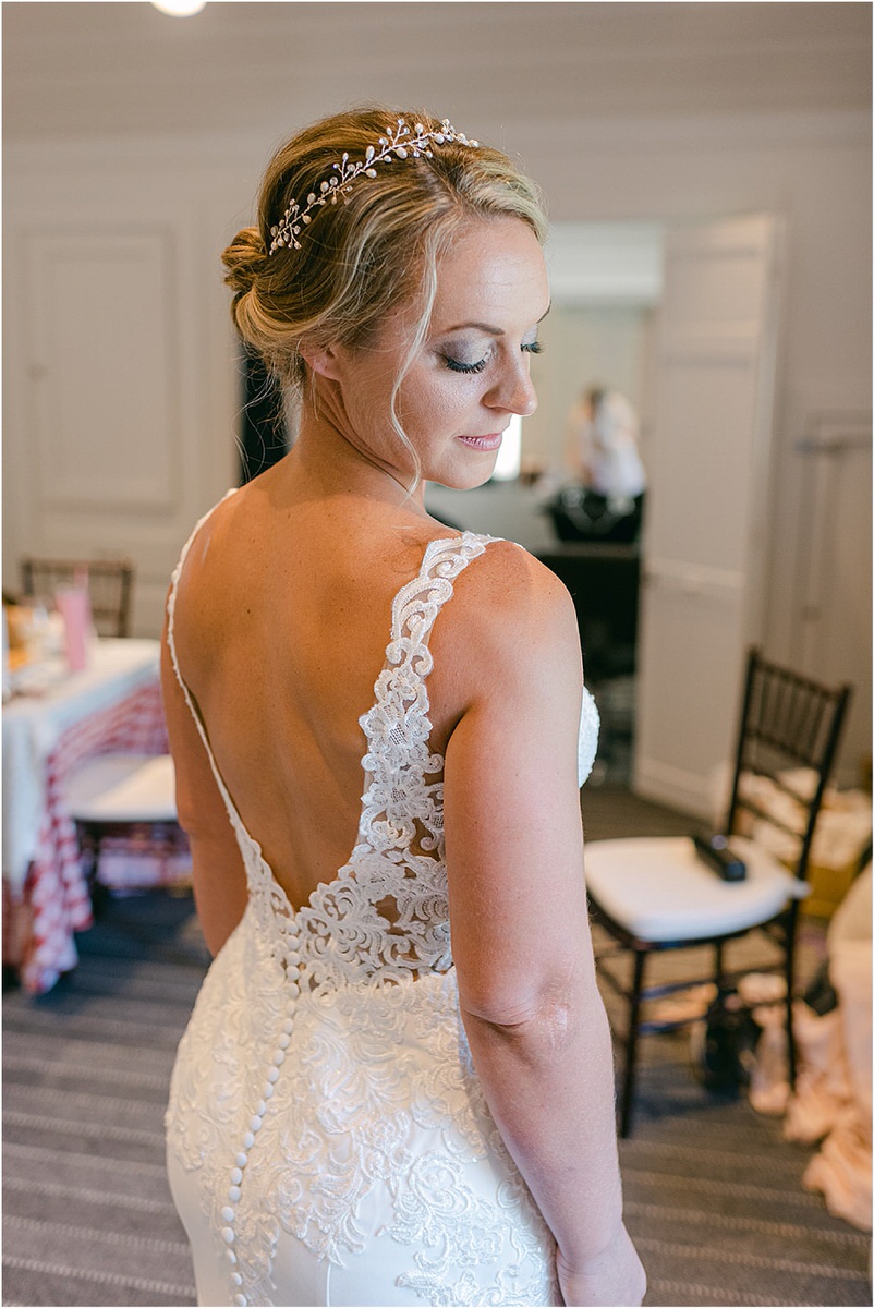 Bride wears stunning bridal gown at Spruce Point Inn