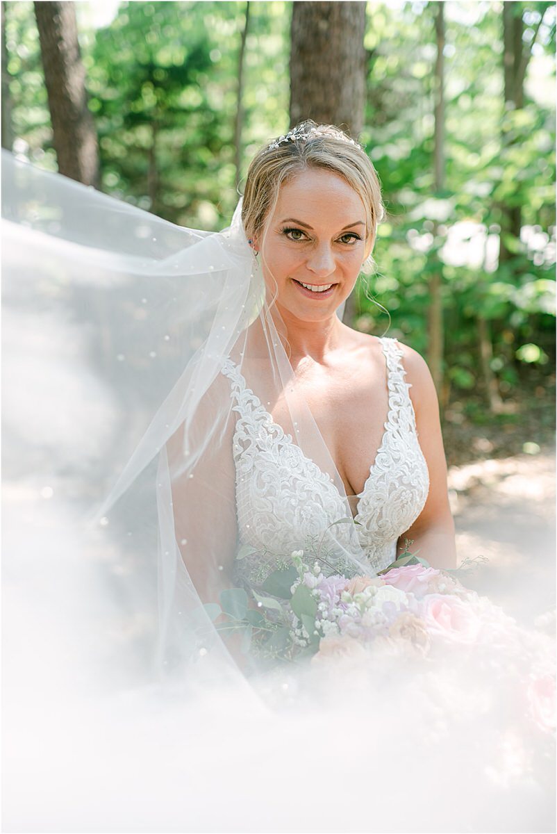Bride wears bridal gown at Spruce Point Inn