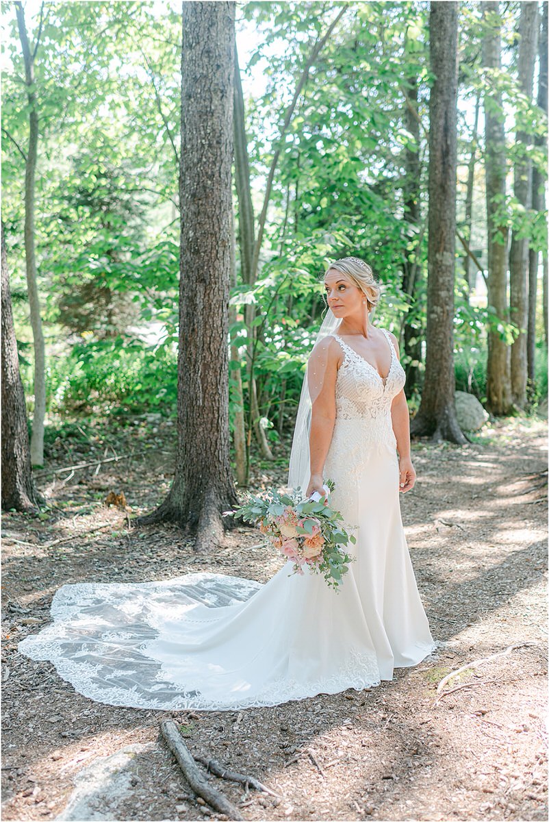 Bride walks in bridal gown at Spruce Point Inn