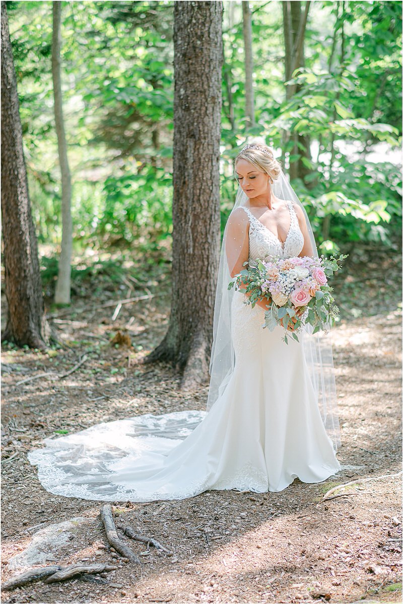 Bride wears bridal gown at Spruce Point Inn