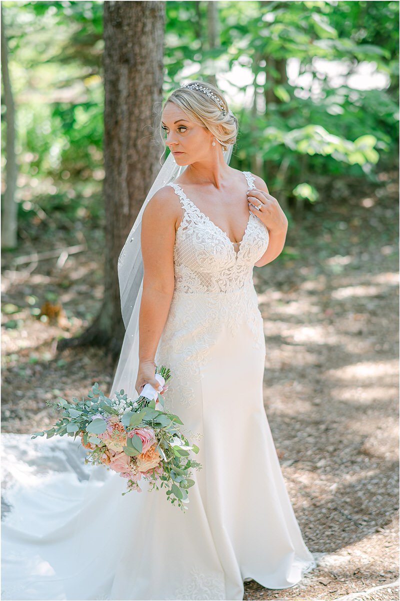 Bride wears bridal gown at Spruce Point Inn