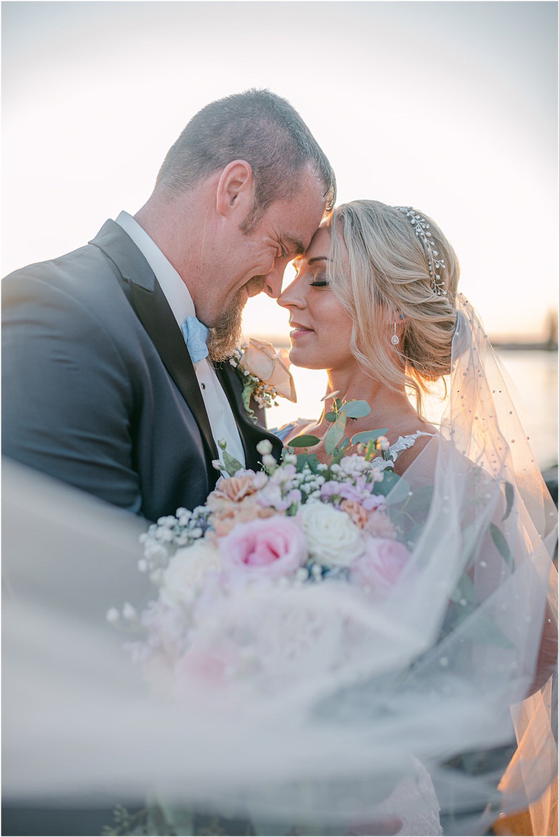 Man and woman cuddle in close together for Rachel Campbell Photography