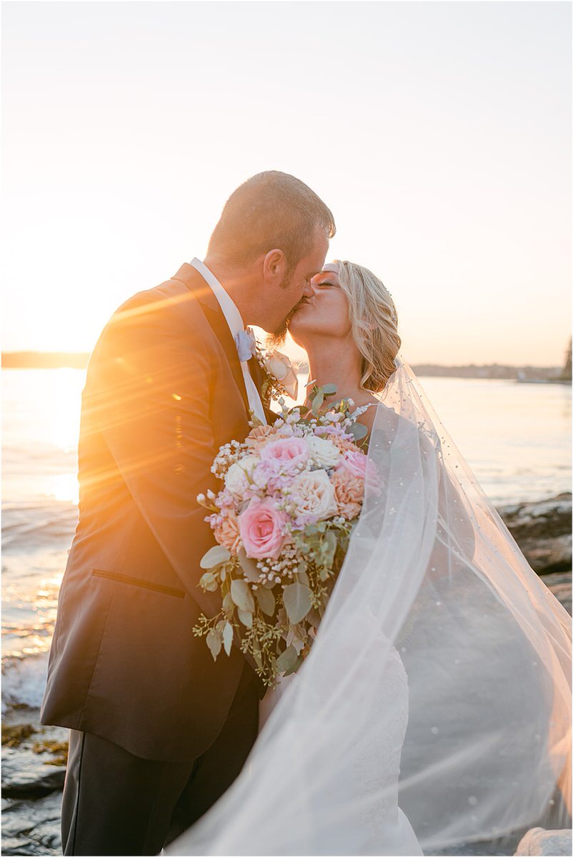 Bride and groom share a kiss for Rachel Campbell Photography