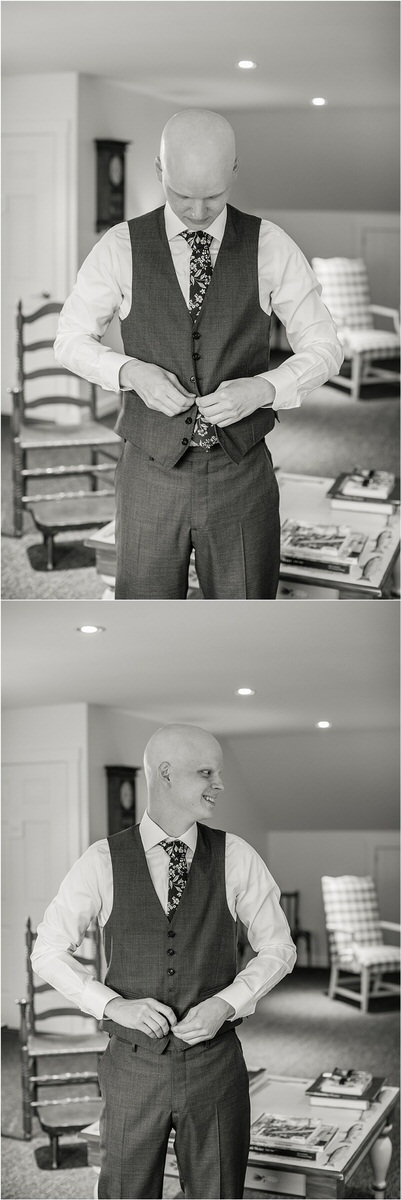 Groom puts on wedding suit for wedding at The 1812 Farm