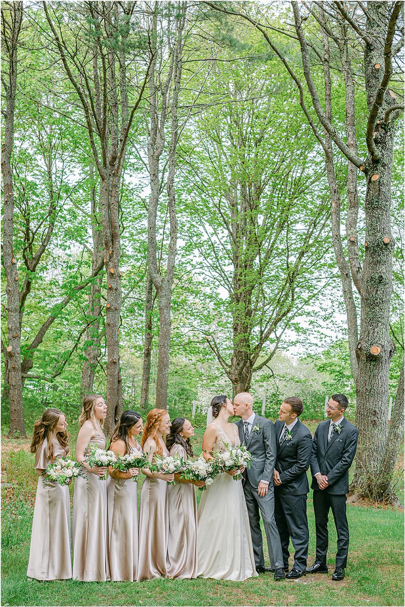 Couple and wedding party celebrate together for New England Wedding Photographer