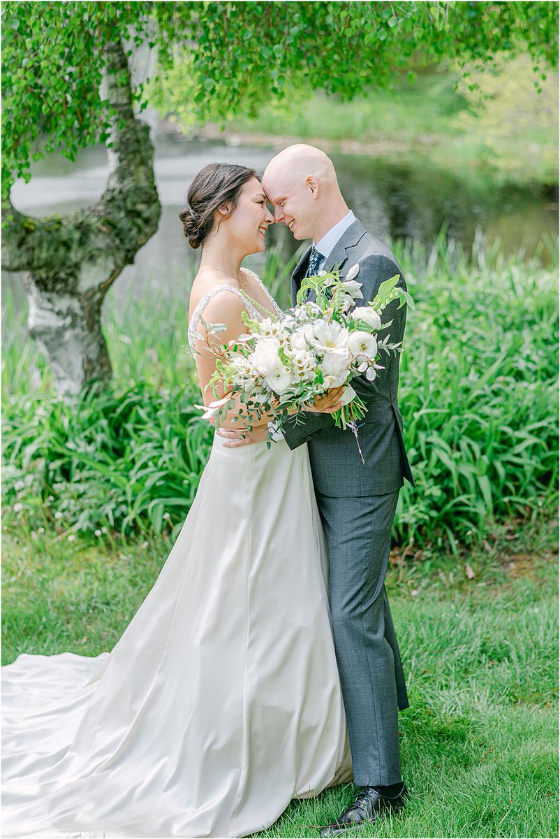 Husband and wife hold each other close for New England Wedding Photographer