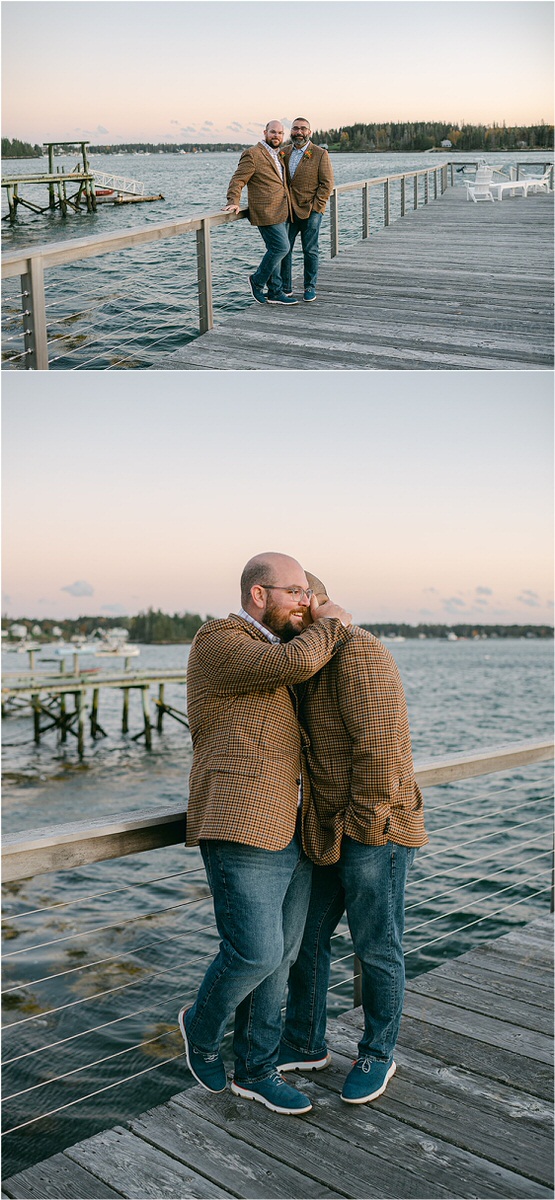 Couple cuddle in close together on a lighthouse bridge before their Maine fall elopement