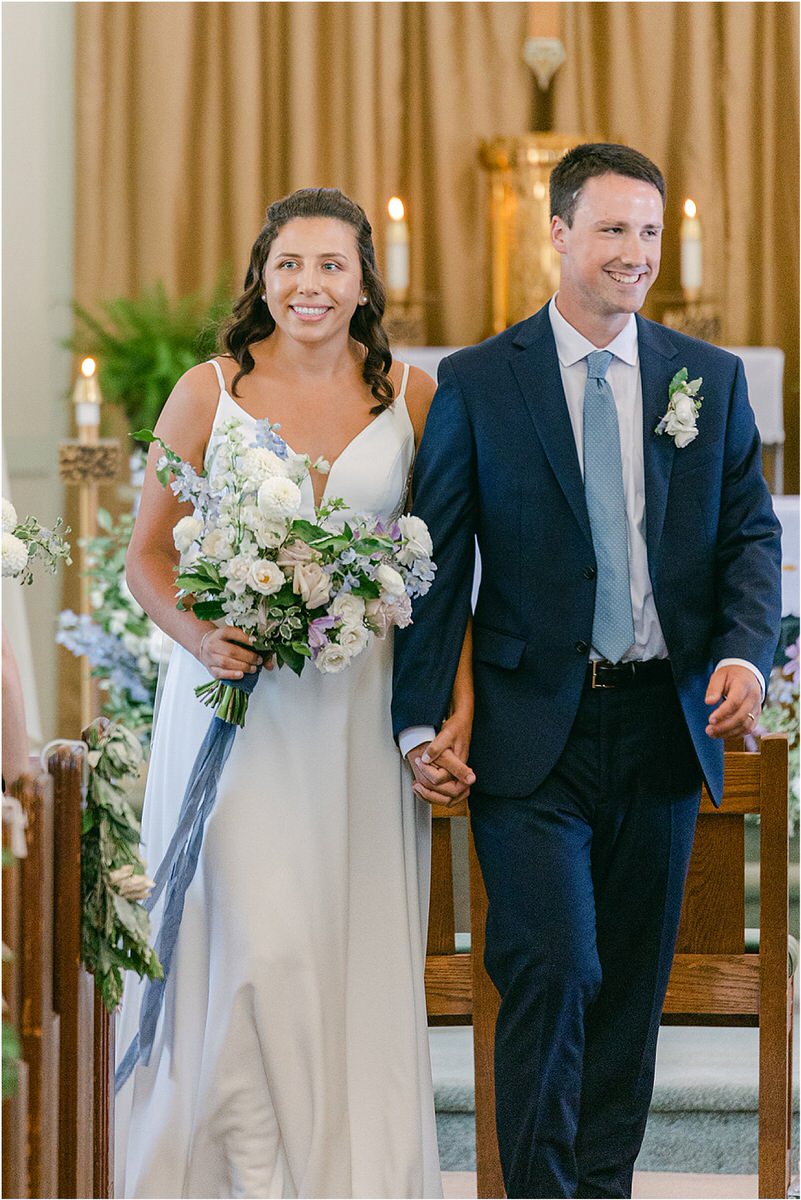Couple walks down the aisle before celebration at Portland's Ocean Gateway