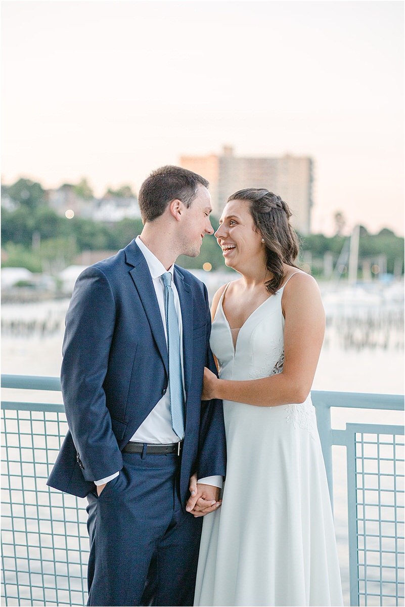 Bride and groom smile at each other for Rachel Campbell Photography