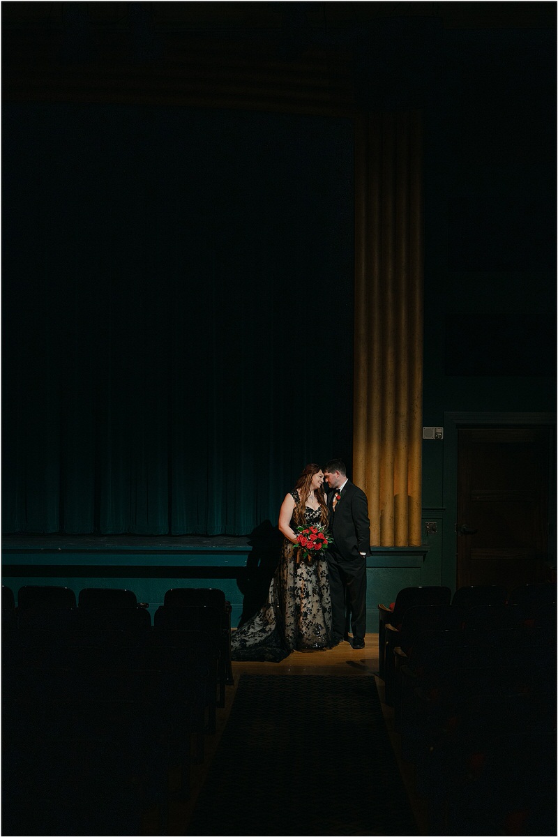 Couple stand together at The Strand Theatre
