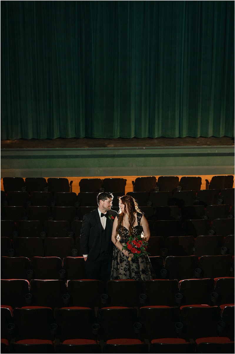 Couple stand together in The Strand Theatre
