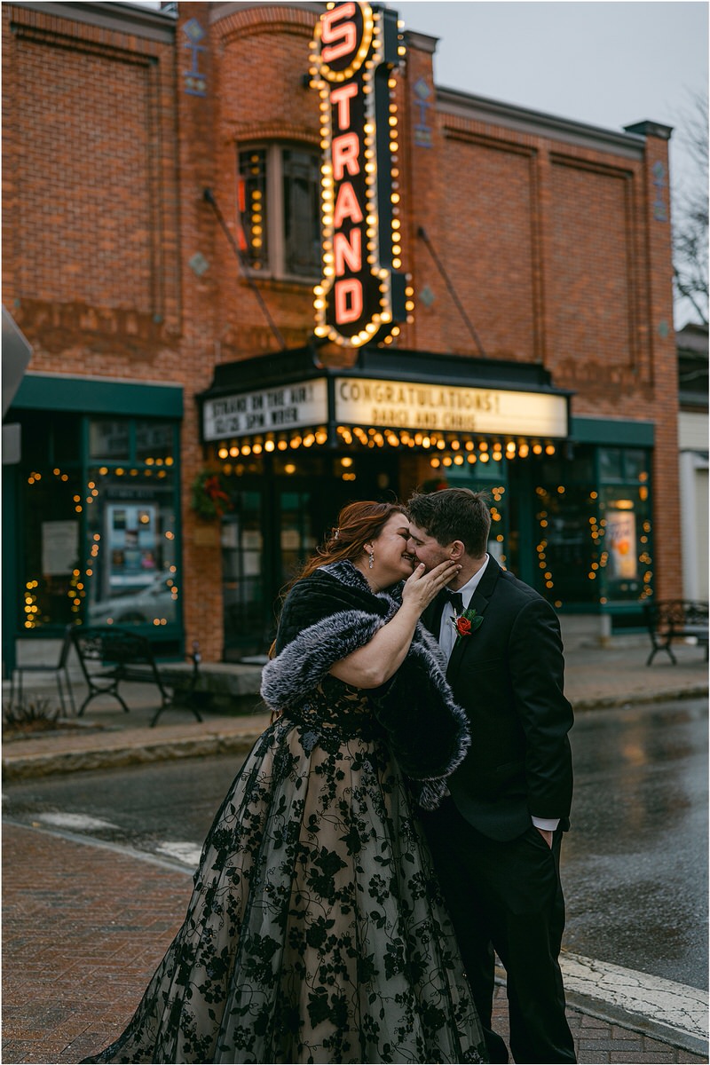 Man and woman share a kiss for Rachel Campbell Photography