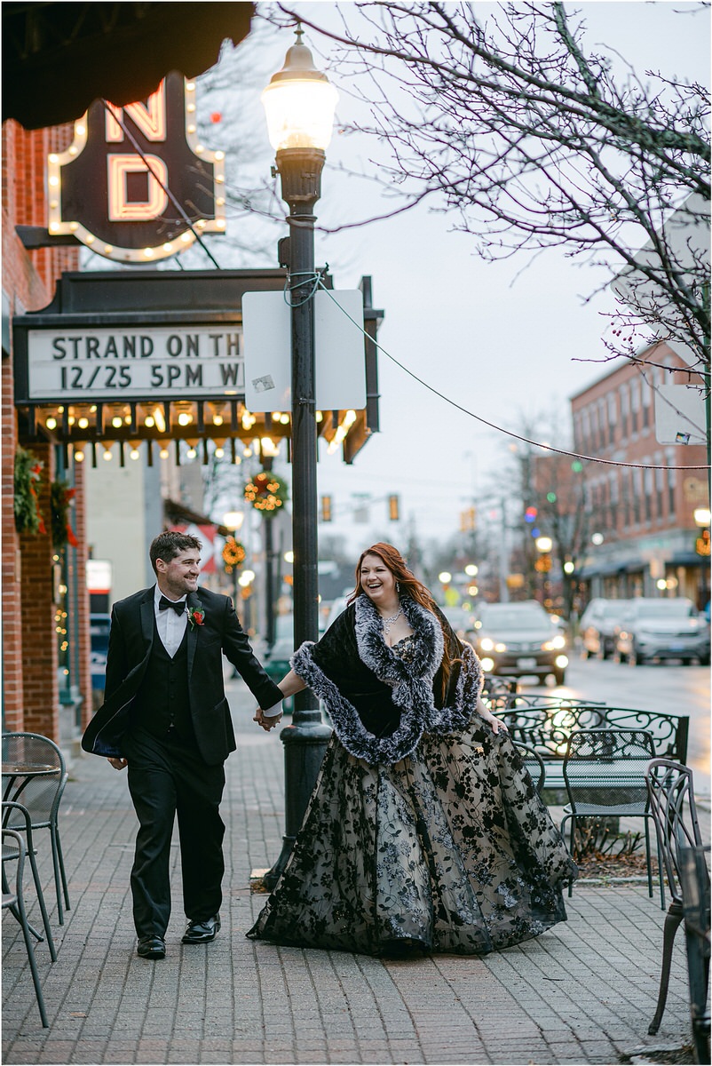 Couple walk hand in hand together down the street for Rachel Campbell Photography