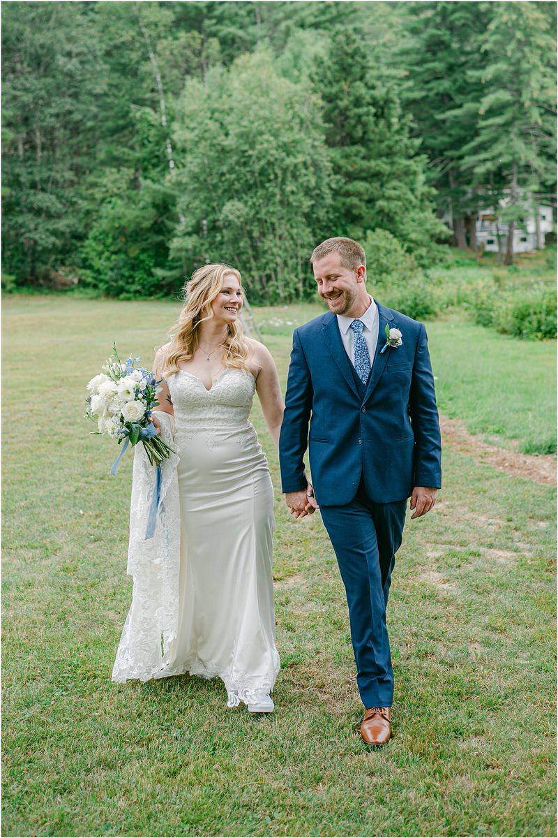 Couple walk together and holds hands at Bear Mountain Inn