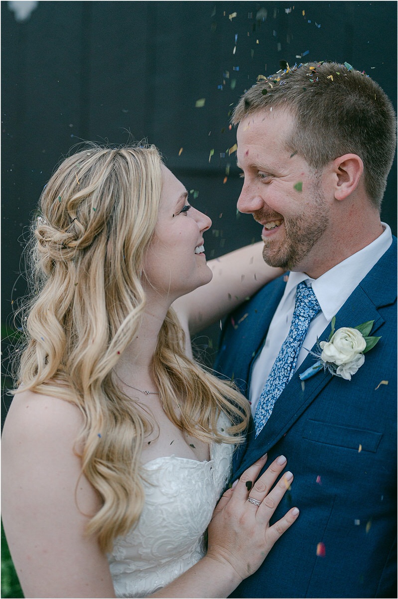 Bride smiles at groom for Rachel Campbell Photography