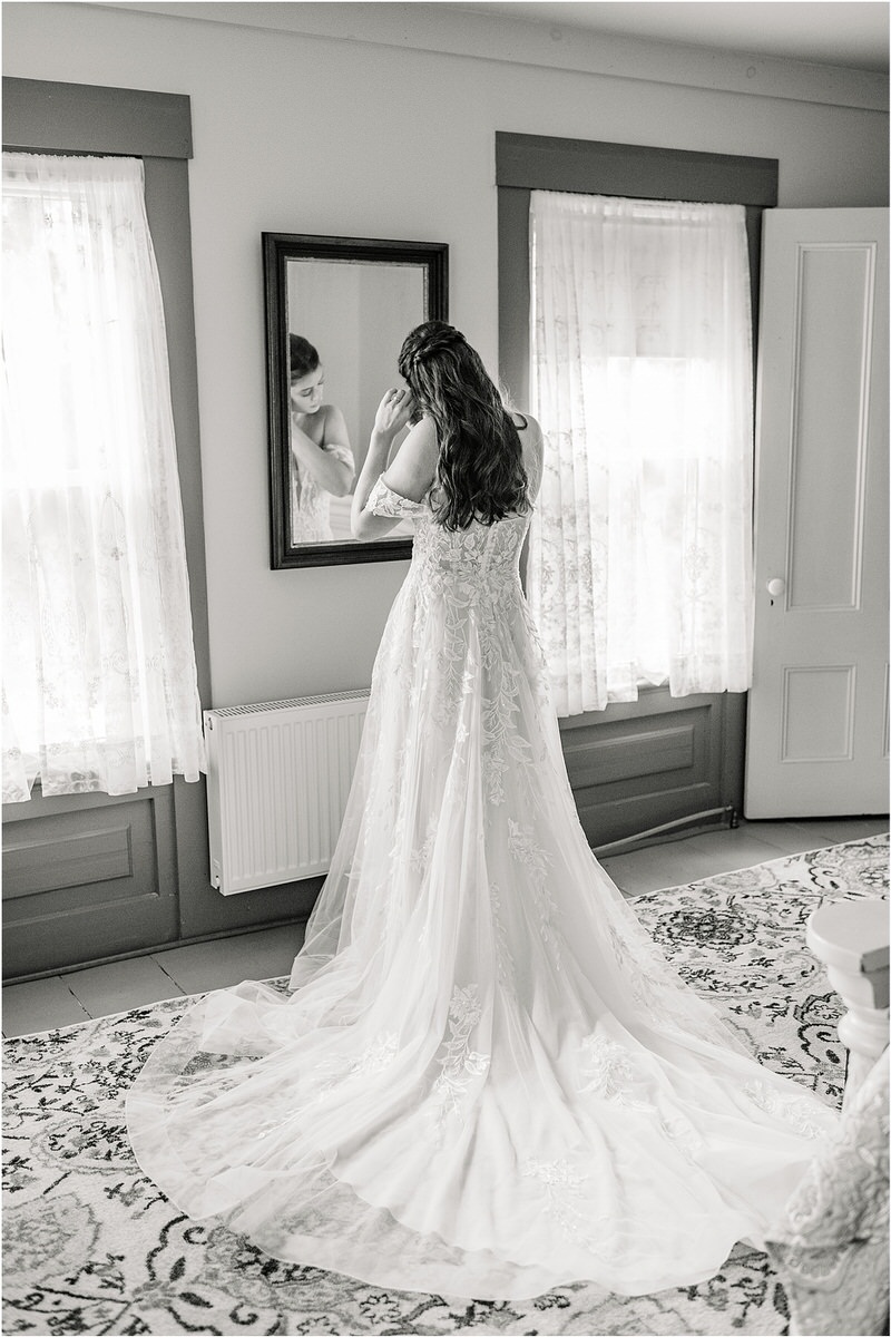 Bride wears earrings for Rachel Campbell Photography