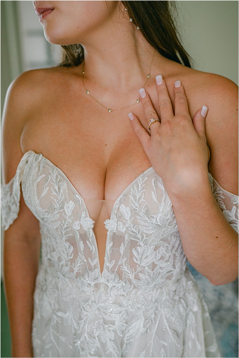 Wedding dress details and wedding ring for Rachel Campbell Photography