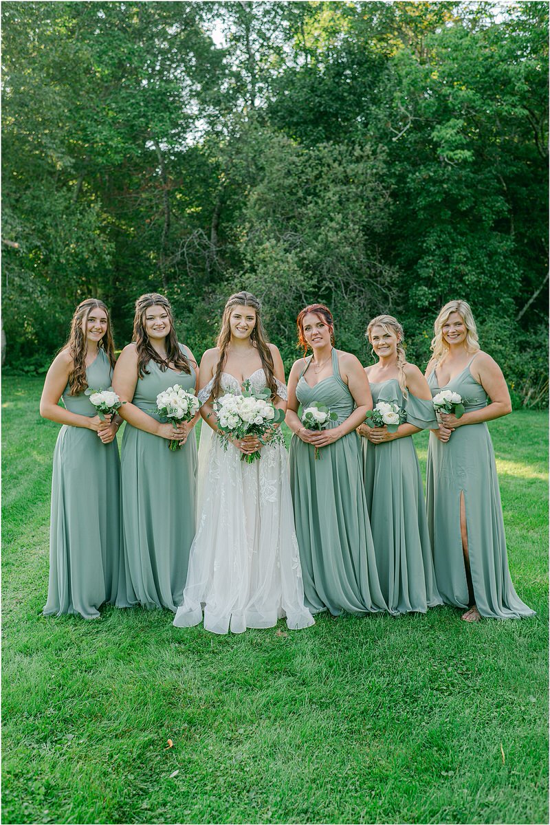 Bride stands with bridesmaids at Harmony Hill Farm