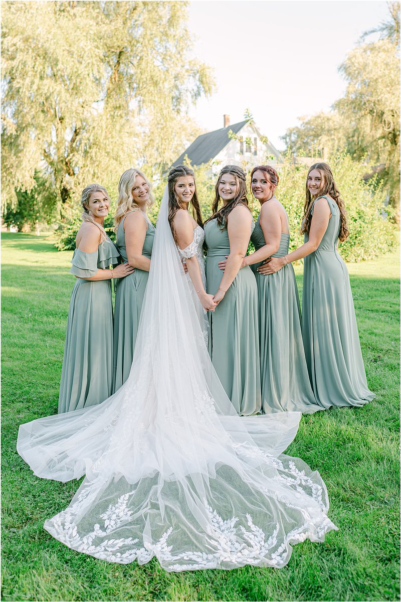 Bride stands with bridesmaids at Harmony Hill Farm
