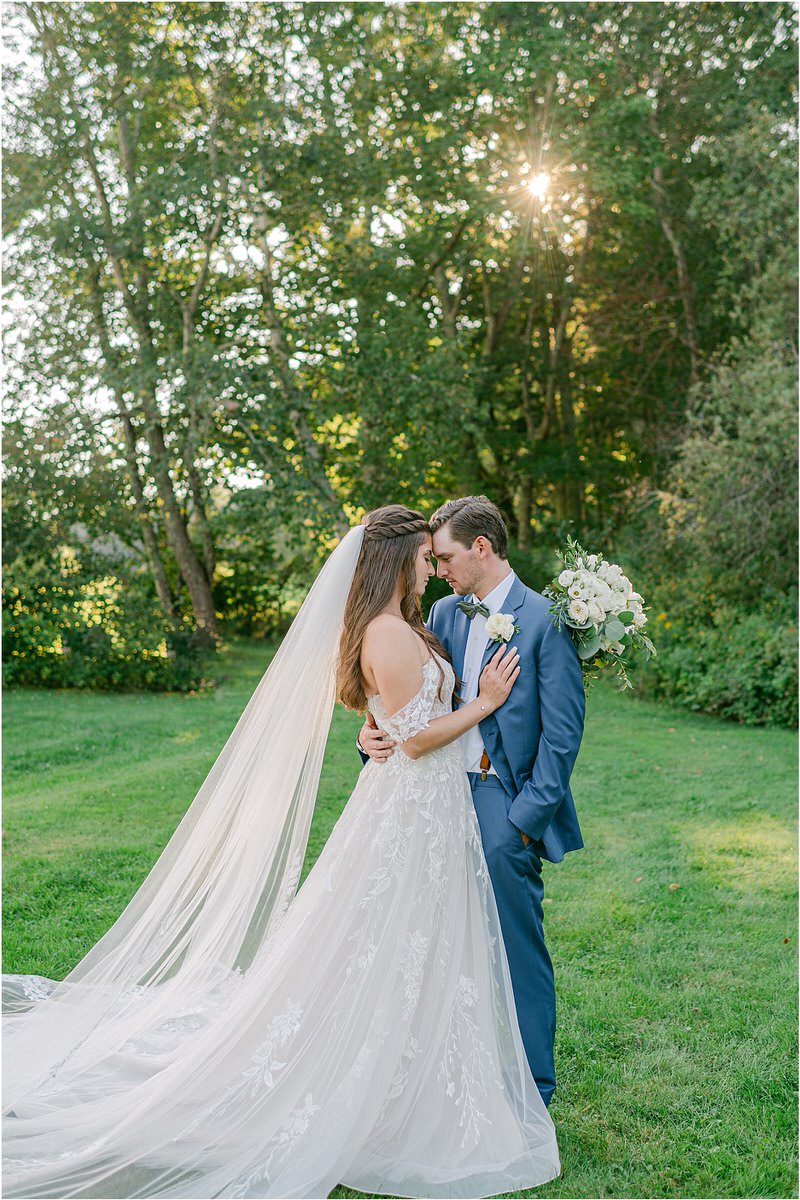 Bride rests her hand on grooms shoulder for Rachel Campbell Photography